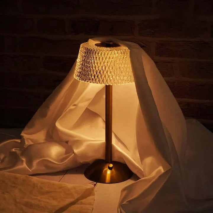 Bezprzewodowa lampa stołowa z metalu i kryształu
