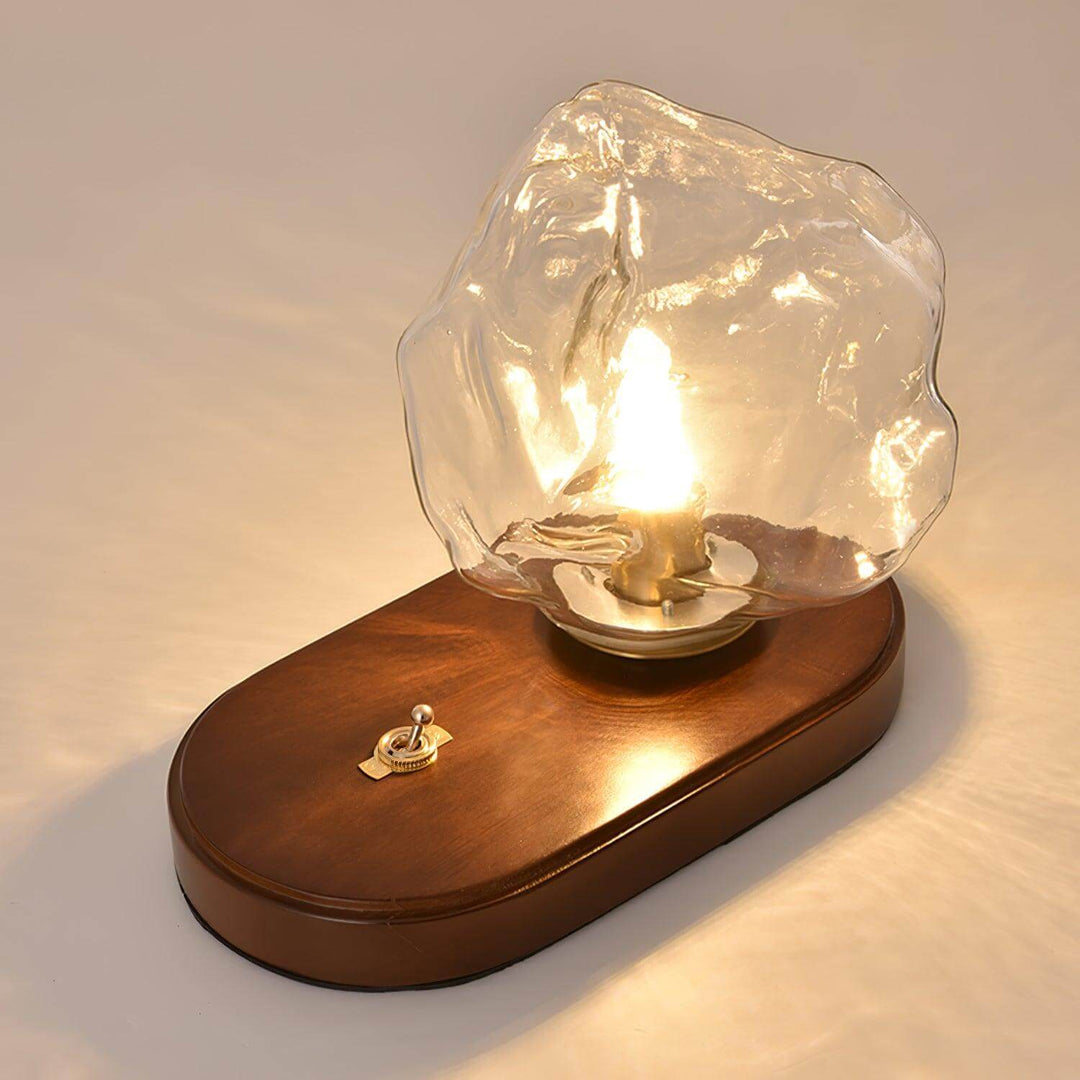 Szklana designerska lampa stołowa w kształcie bryły lodu od góry