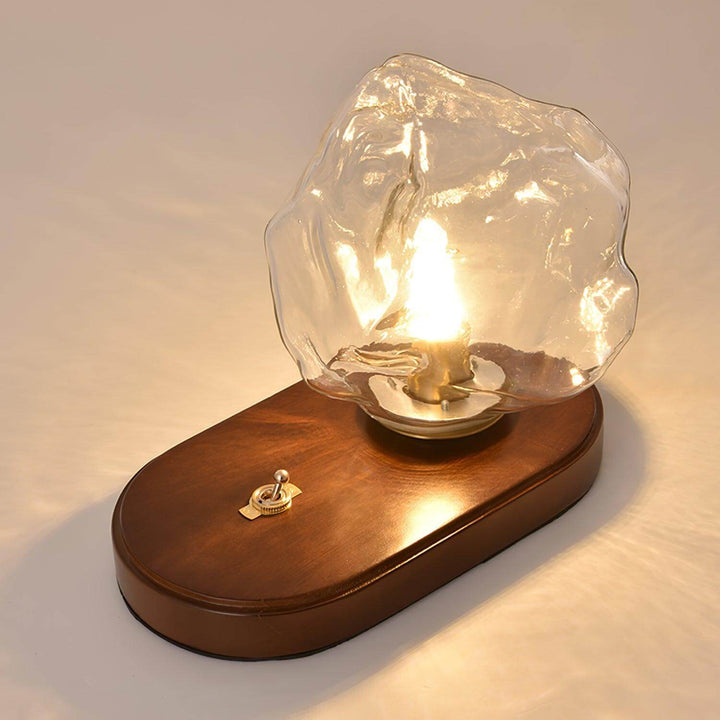 Szklana designerska lampa stołowa w kształcie bryły lodu od góry