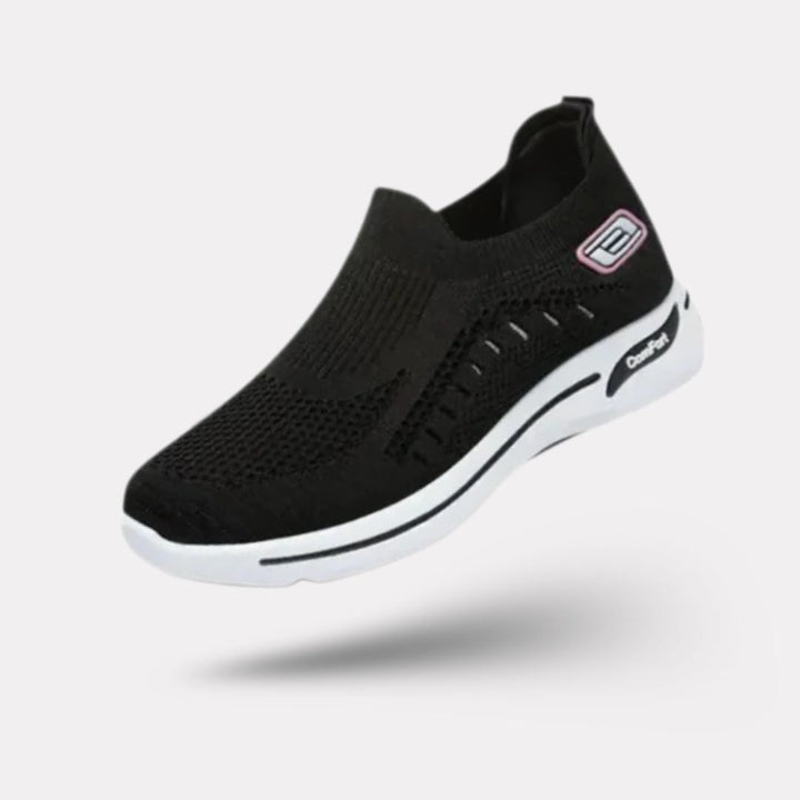 Damskie buty sportowe ortopedyczne w kolorze ciemnoszarym, nowoczesny styl i wygodne podeszwy, elegancki widok z boku.
