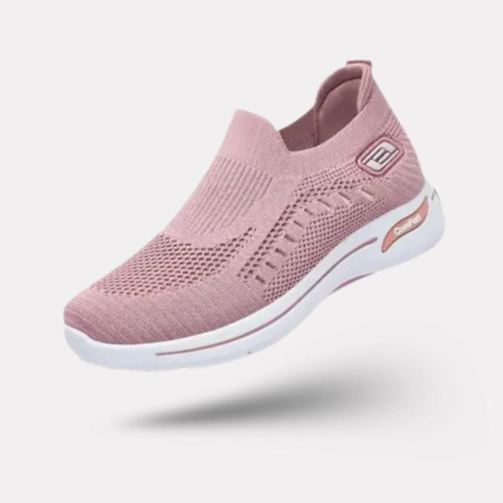 Damskie buty sportowe ortopedyczne w kolorze ciemnoszarym, nowoczesny styl i wygodne podeszwy, elegancki widok z boku.