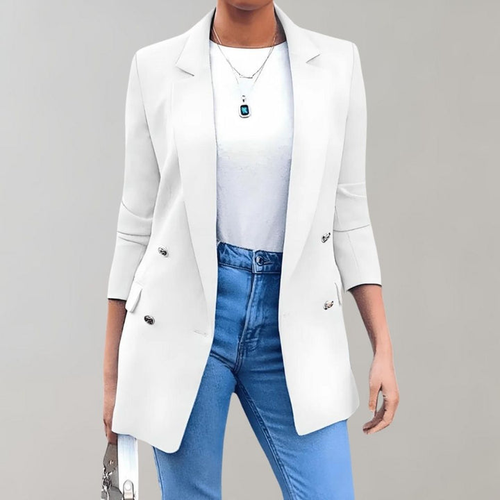Elegancka szara damska marynarka, dopasowany krój, idealna do biura lub na kolację, komfortowa i wszechstronna.