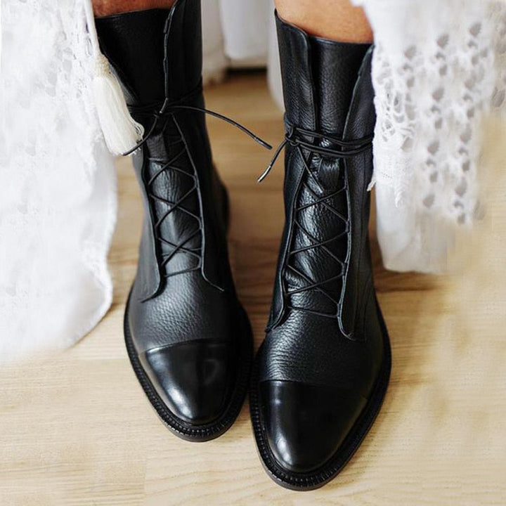 Klasyczne damskie botki z prawdziwej skóry w kolorze czarnym i brązowym, elegancki design i najwyższy komfort, antypoślizgowa podeszwa.