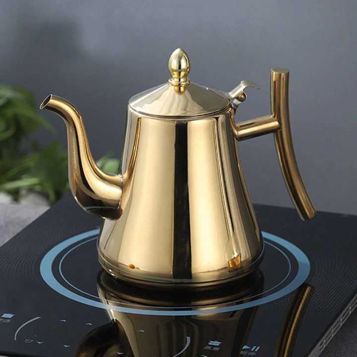 Czajnik indukcyjny ze stali nierdzewnej 1L, ze zintegrowanym filtrem, w eleganckim srebrnym designie, idealny do nowoczesnej kuchni, do szybkiego i trwałego podgrzewania.