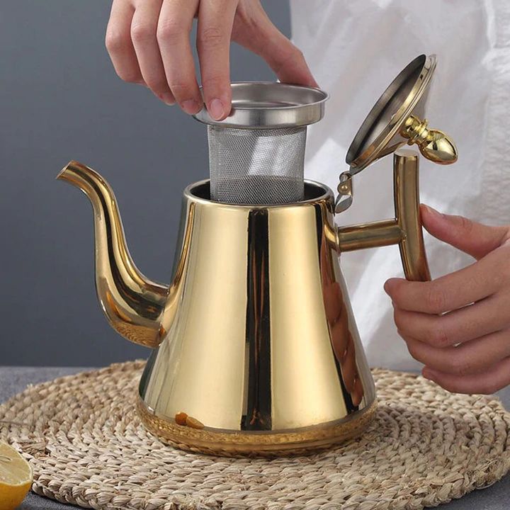 Czajnik indukcyjny ze stali nierdzewnej 1L, ze zintegrowanym filtrem, w eleganckim srebrnym designie, idealny do nowoczesnej kuchni, do szybkiego i trwałego podgrzewania.
