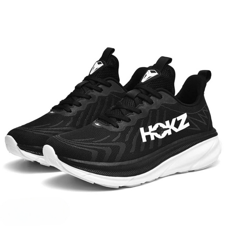 Lekkie buty do biegania damskie w kolorze czarno-białym, z amortyzacją, nowoczesny design, widok z boku