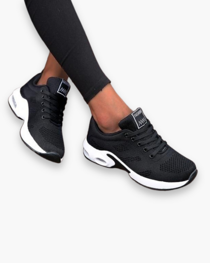Lekkie buty sportowe dla kobiet, nowoczesny design, oddychający materiał, amortyzująca podeszwa, atrakcyjny kolor.