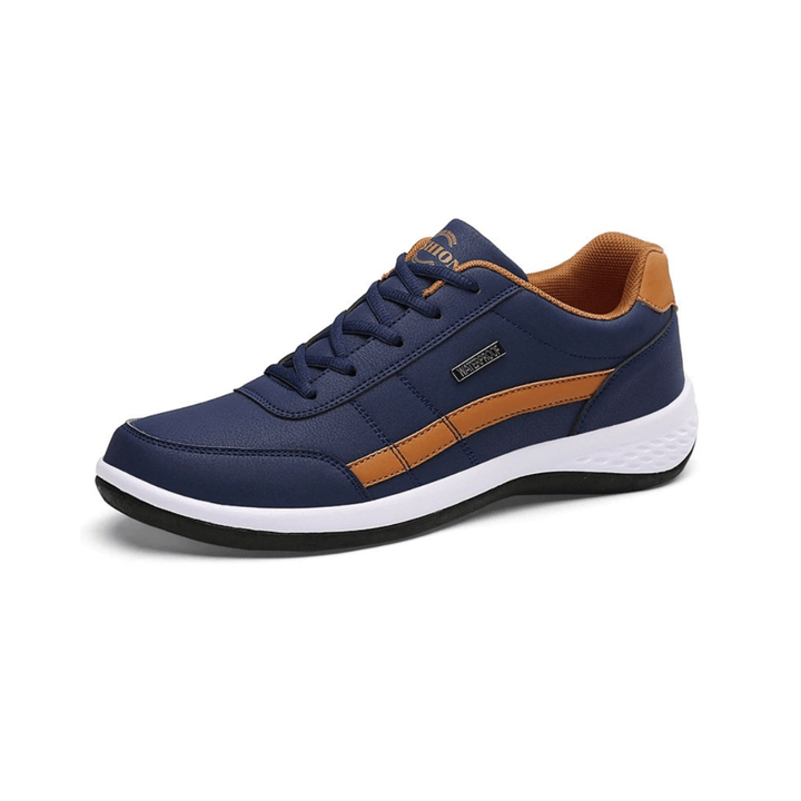 Białe męskie buty ortopedyczne, nowoczesny styl i ergonomiczne wsparcie dla optymalnego komfortu i elegancji.