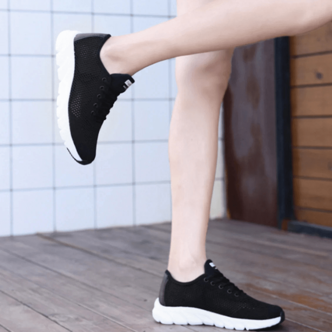 Nowoczesne, oddychające, eleganckie buty ortopedyczne dla kobiet, widok z przodu, dostępne w kolorach białym, czarnym i różowym, zapewniające komfort i styl.