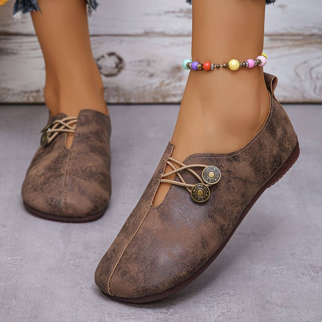Ortopedyczne buty damskie, elastyczny design, wsparcie i komfort, oddychająca cholewka, elegancki neutralny kolor.