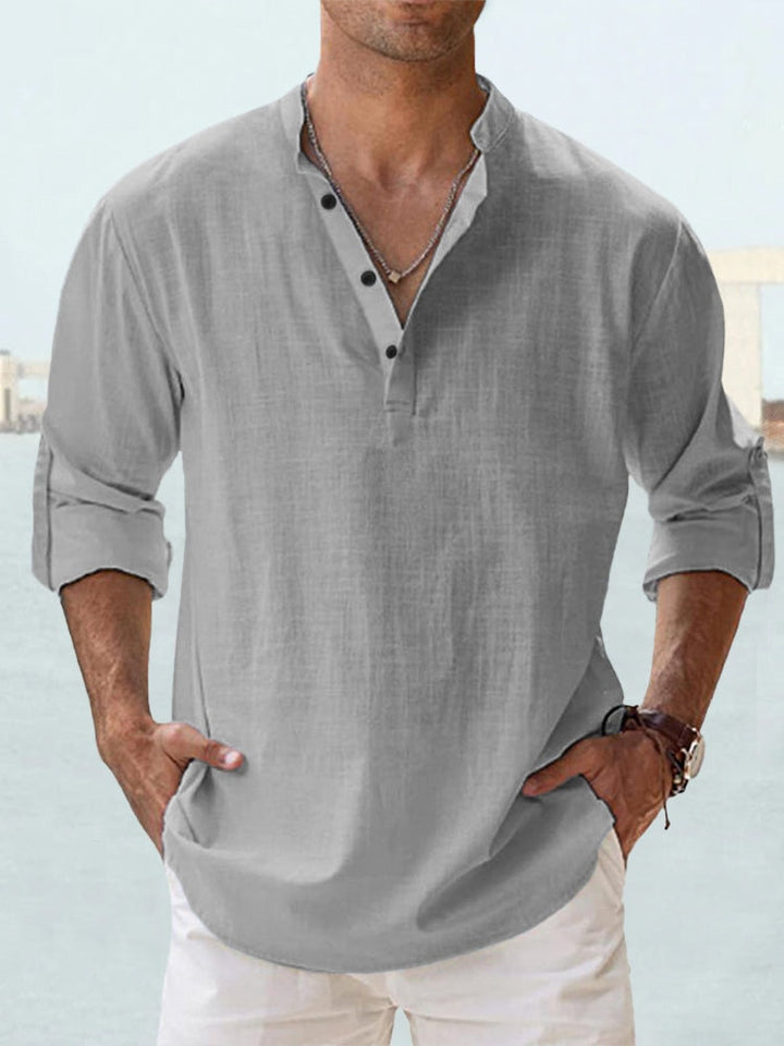 Męska koszula lniana, lekka i oddychająca, kołnierzyk Henley, krój slim fit, eleganckie guziki, idealna do swobodnych stylizacji.
