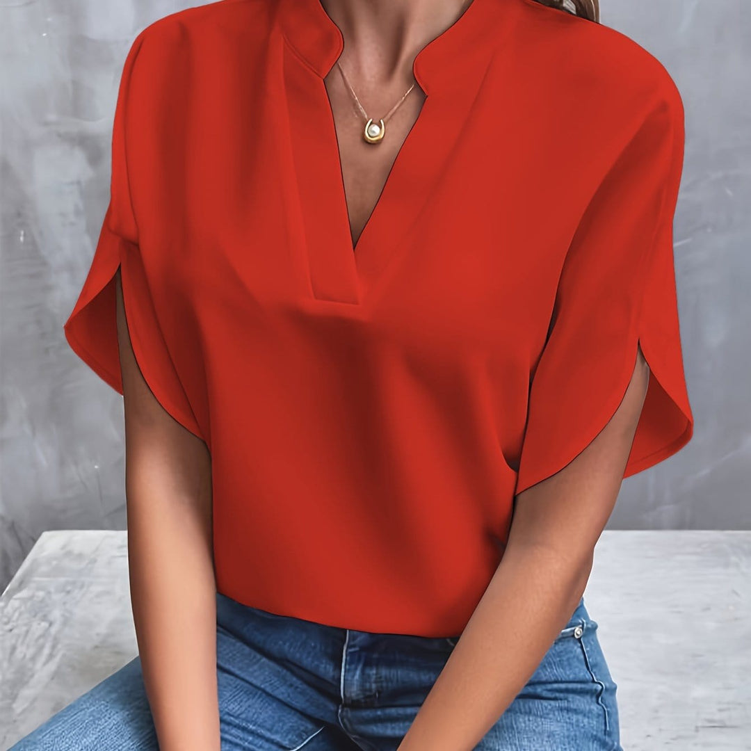 Elegancka satynowa koszula Capucine dla kobiet, delikatny kołnierzyk i mankiety, wyrafinowany design dla wyrafinowanego wyglądu.