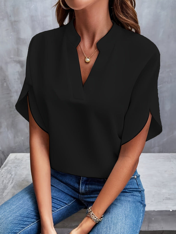 Elegancka satynowa koszula Capucine dla kobiet, delikatny kołnierzyk i mankiety, wyrafinowany design dla wyrafinowanego wyglądu.