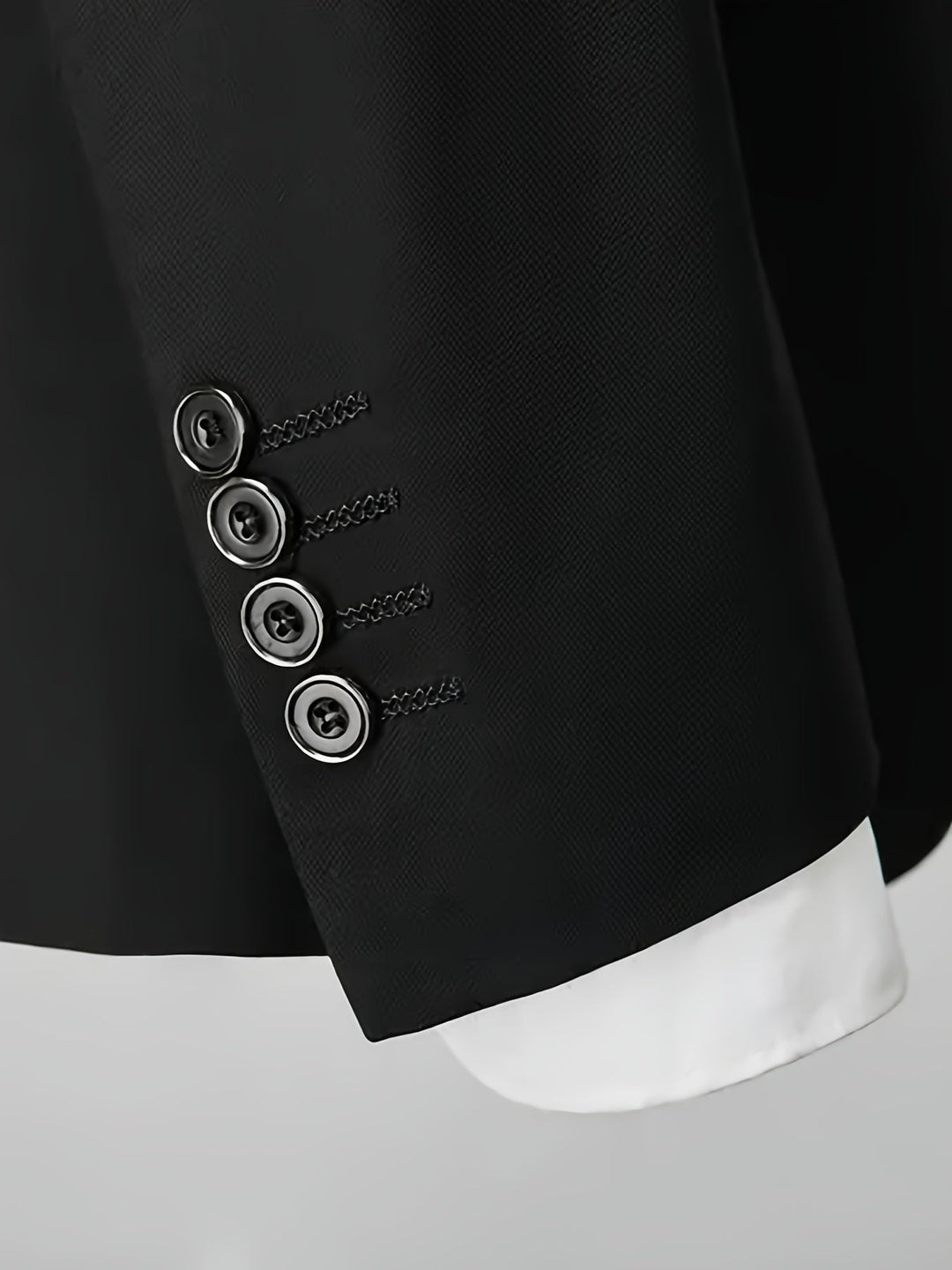 Stylowy męski garnitur, marynarka i spodnie, idealny na formalne przyjęcia i wydarzenia biznesowe, współczesny design.