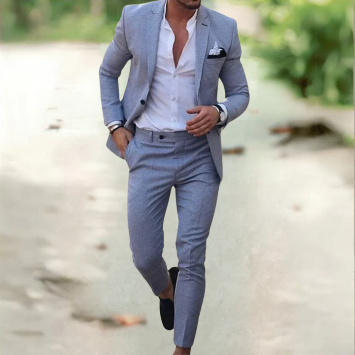 Elegancki męski garnitur slim fit, dopasowany krój, lekki materiał, na białym tle, idealny na formalne i biznesowe okazje.