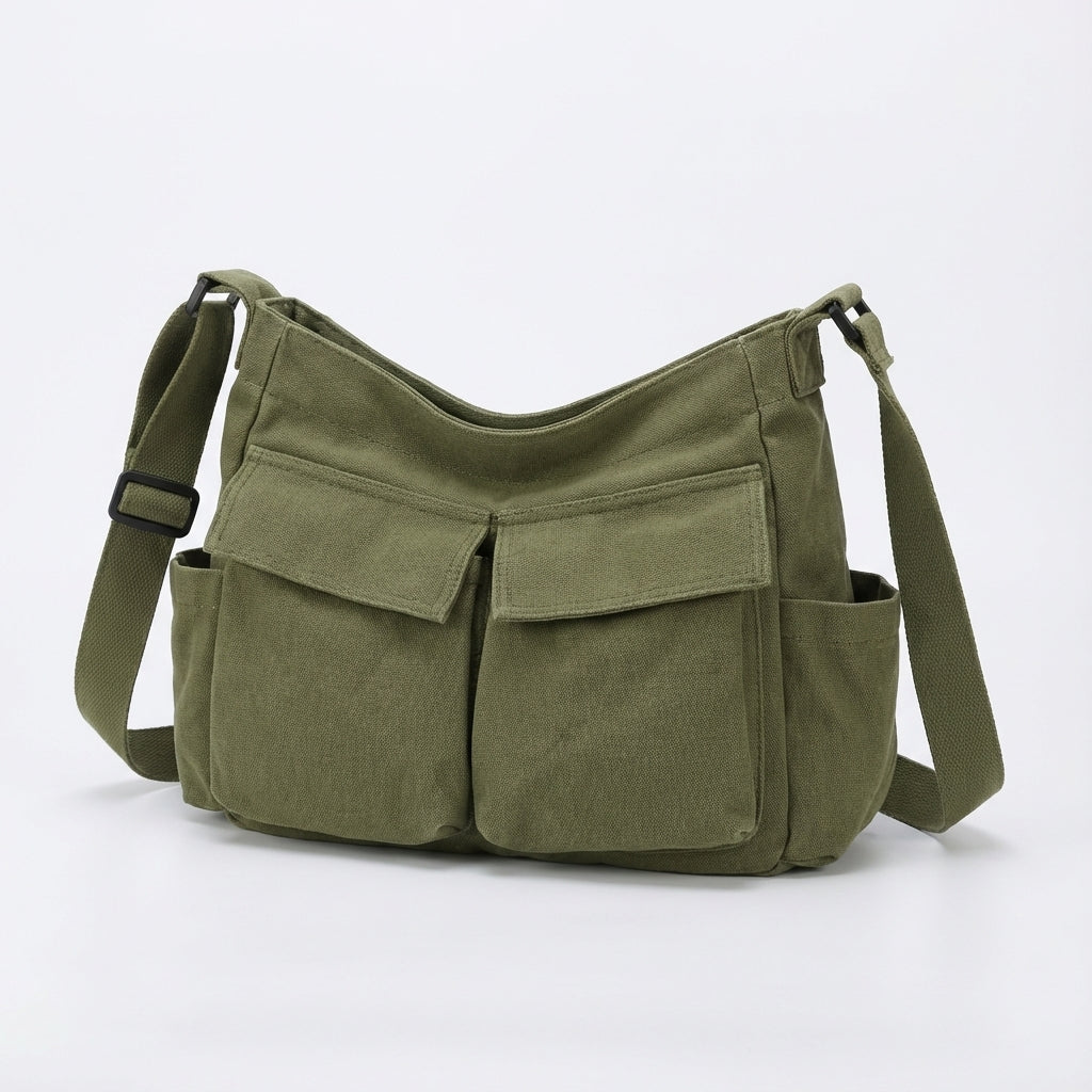 Elegancka czarna listonoszka na ramię z płótna. Torba unisex z dużą pojemnością, idealna do pracy i miasta.