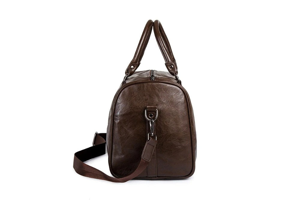 Czarny duży bagaż podręczny ze skóry PU. Torba podróżna na ramię, idealna na weekend.
