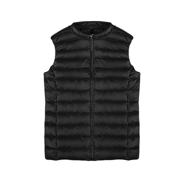 Ultralekka kamizelka puchowa damska, elegancki design, kompaktowa, wodoodporna, idealna na każdą pogodę.