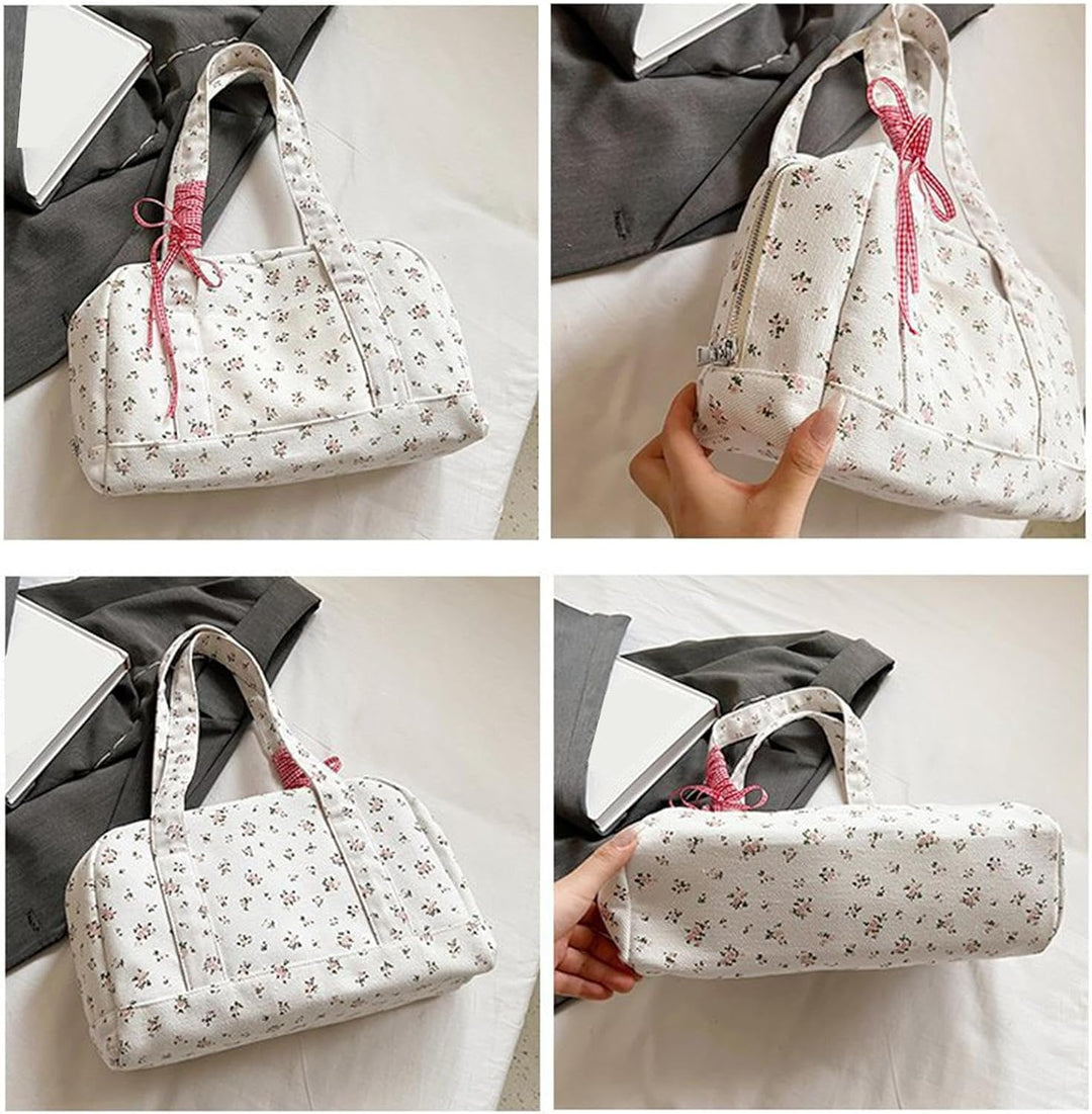 Modna damska torba duffle Floria na ramieniu, elegancka i pojemna do miejskich stylizacji.