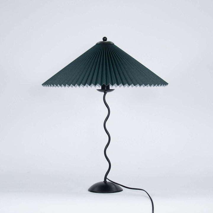 Zakrzywiona lampa stołowa – Oświetlenie nastrojowe