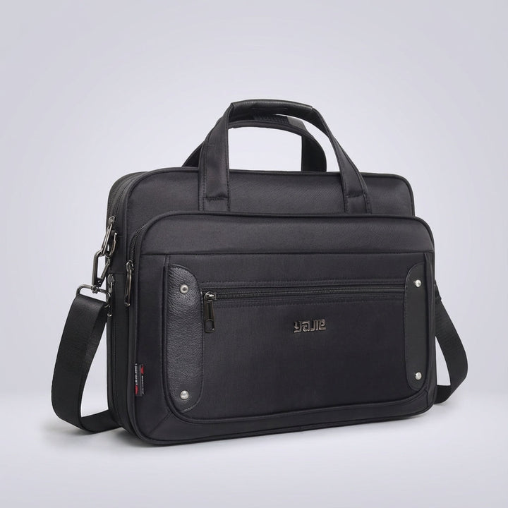 Uniwersalna torba na laptopa UrbanBrief z licznymi przegrodami. Elegancka, duża torba unisex idealna do biura i podróży.
