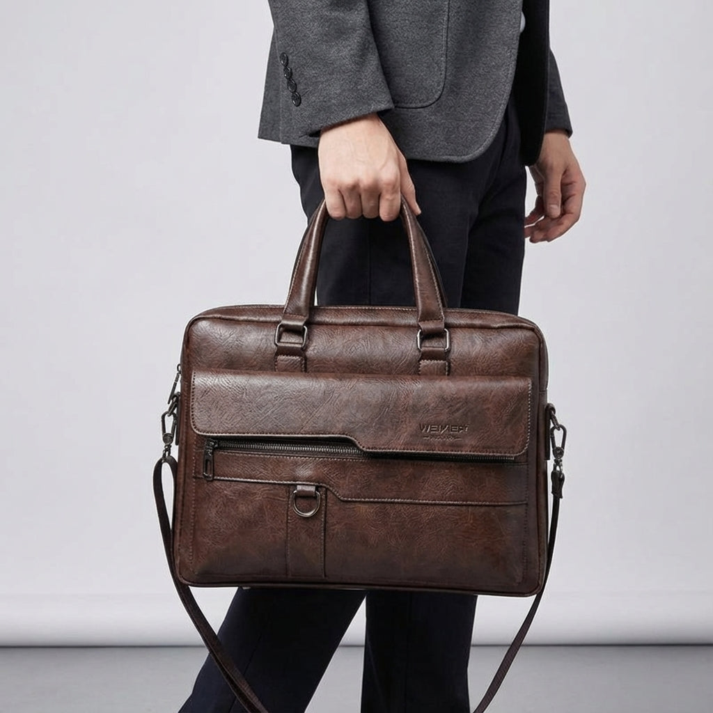 Wytrzymała torba na ramię na laptopa, z wysokiej jakości PU skóry. Elegancki design i profesjonalny wygląd.