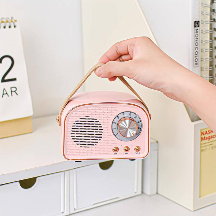 Vintage'owy głośnik Bluetooth o designie retro, wbudowane radio FM, kompaktowy, elegancki, czysty dźwięk, różnorodne opcje kolorystyczne.