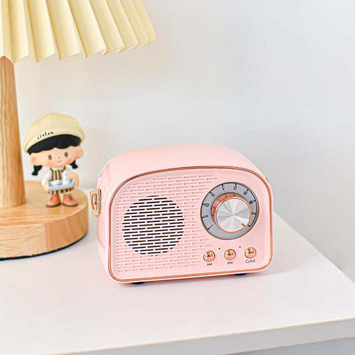 Vintage'owy głośnik Bluetooth o designie retro, wbudowane radio FM, kompaktowy, elegancki, czysty dźwięk, różnorodne opcje kolorystyczne.