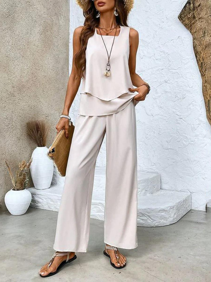 Ensemble floral femme chic, haut à imprimé floral, pantalon flatteur élégant et confortable, idéal pour soirées décontractées