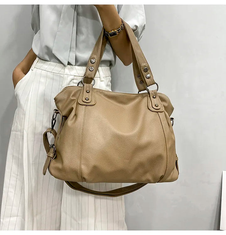 Elegancka torba shopper ze skóry groszkowanej dla studentów i profesjonalistów, przestronna i stylowa, dostępna w kolorze czarnym