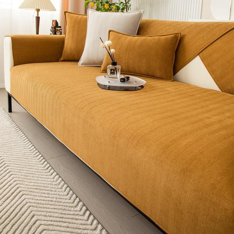 Szykowny, antypoślizgowy pokrowiec na sofę, nowoczesny design, ochrona przed plamami, dostępny w wielu kolorach pasujących do każdego wystroju.