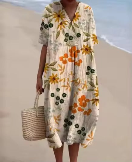 Letnia sukienka damska Odile z bawełny i lnu, z kwiecistym wzorem, eleganckim i wygodnym krojem, idealna na letnie dni.