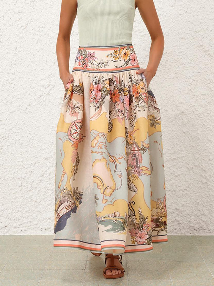 Elegancka spódnica midi z wysokim stanem i delikatnymi kwiatowymi wzorami, idealna do stylu boho i kobiecych stylizacji na każdą porę roku.