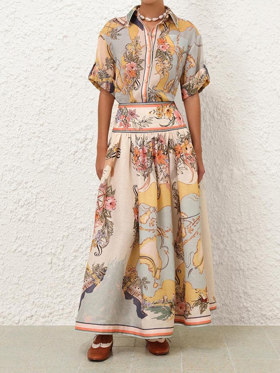 Elegancka spódnica midi z wysokim stanem i delikatnymi kwiatowymi wzorami, idealna do stylu boho i kobiecych stylizacji na każdą porę roku.