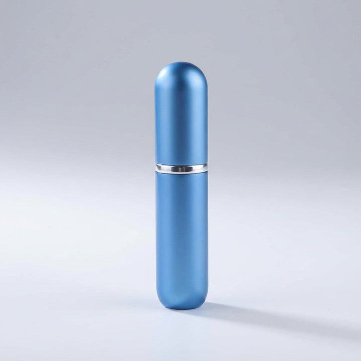 Elegancki, przenośny atomizer perfum PocketMist. Stylowa butelka do uzupełniania ulubionych zapachów.