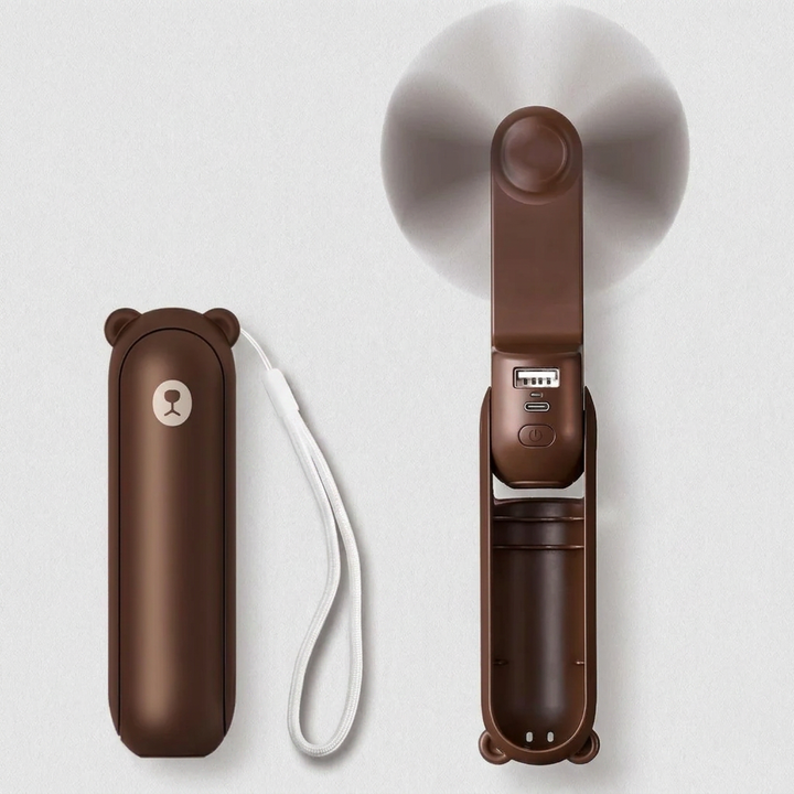 Wielofunkcyjny gadżet podróżny: mini wentylator chłodzący, powerbank i latarka. Niezbędny w podróży.