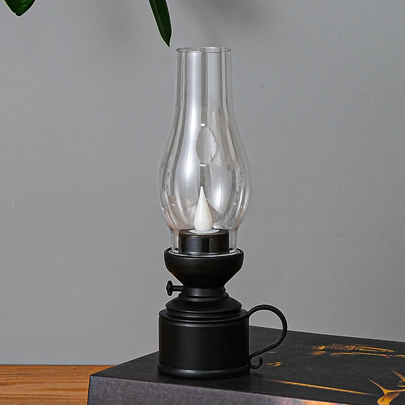 Elegancka lampa olejowa LED z realistycznym efektem płomienia i wyborem kolorów, idealna do stworzenia ciepłej atmosfery i bezpiecznego dopasowania