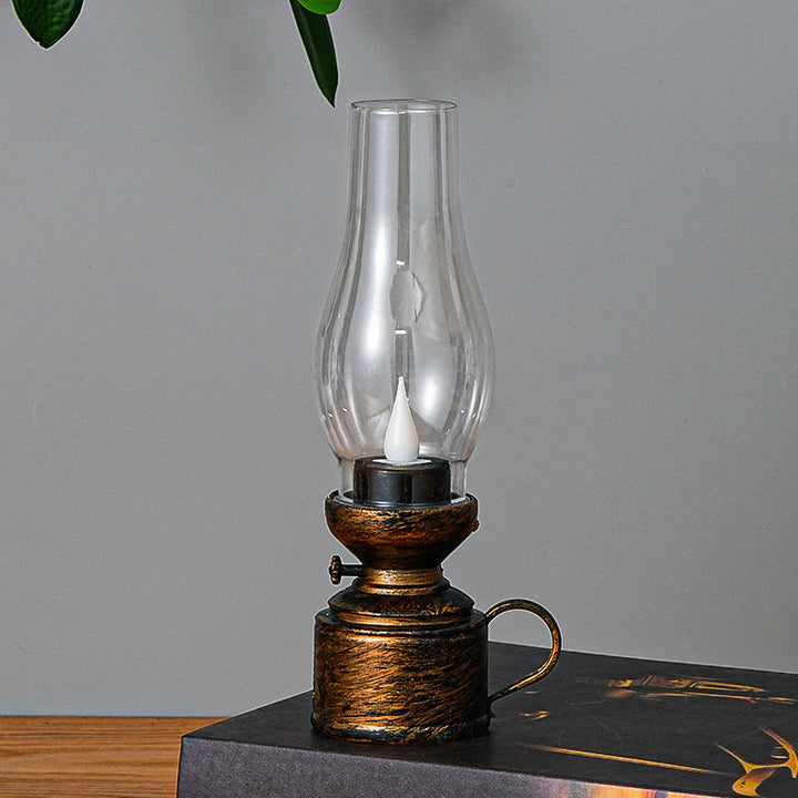Elegancka lampa olejowa LED z realistycznym efektem płomienia i wyborem kolorów, idealna do stworzenia ciepłej atmosfery i bezpiecznego dopasowania