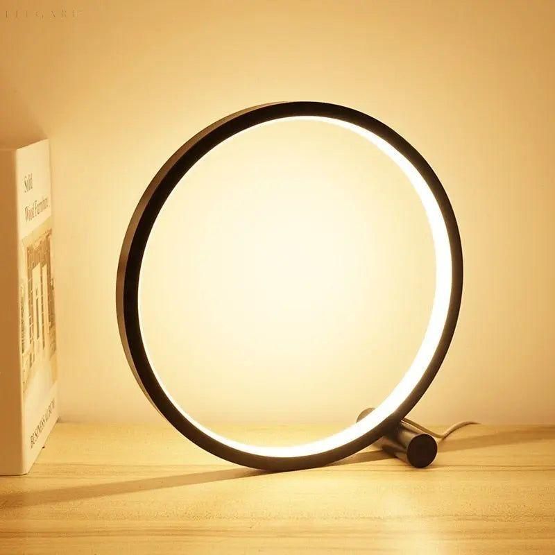 Nowoczesna dotykowa lampa stołowa LED o okrągłym, minimalistycznym designie, zapewniająca eleganckie oświetlenie.