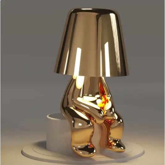 Designerska lampa LED Mr. Gold w kolorze złotym, bezprzewodowa, idealna do stylowego oświetlenia.