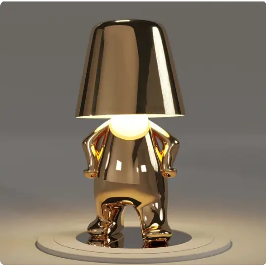 Złota lampa LED bezprzewodowa, z miękkim światłem, by stworzyć spokojną i relaksującą atmosferę.