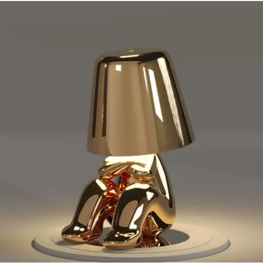 Nowoczesna bezprzewodowa lampa LED Mr. Gold w kolorze złotym, z funkcją dotykową.
