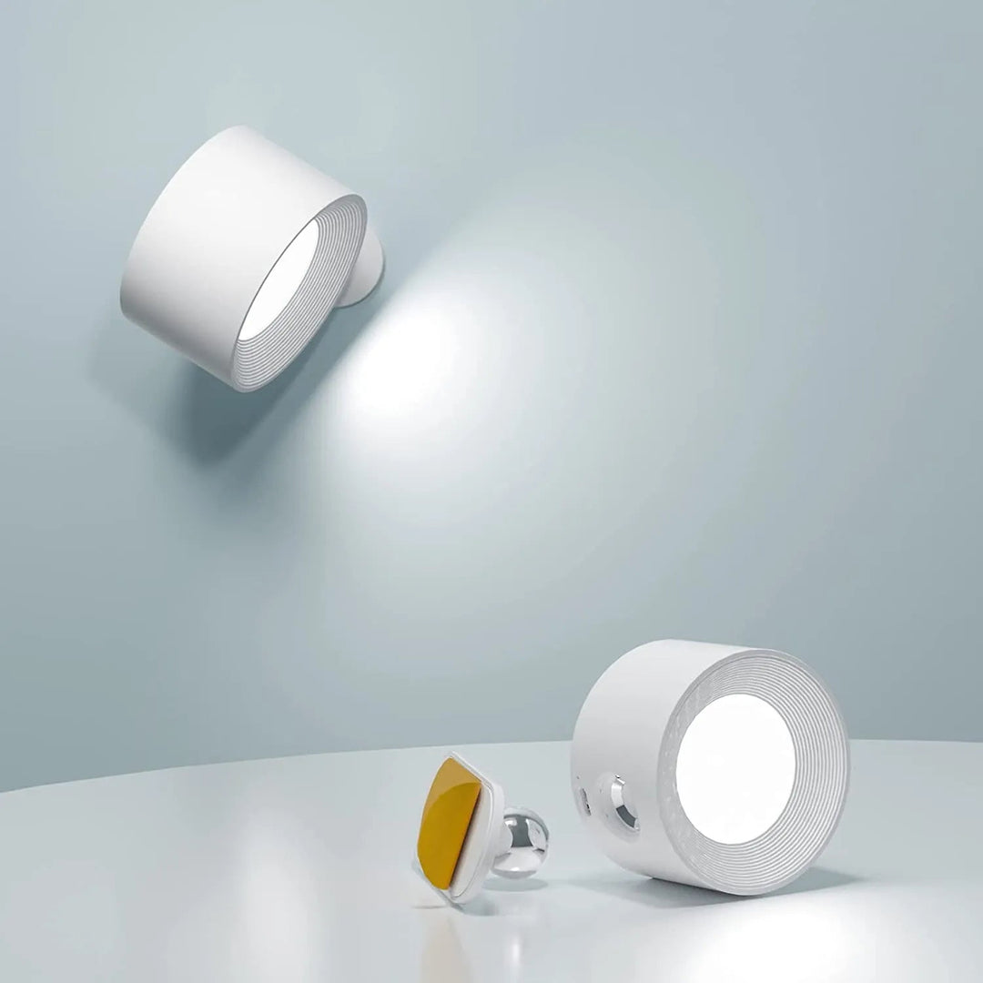 Bezprzewodowa lampa ścienna LED, magnetyczna, ładowalna, nowoczesny design, łatwa instalacja, biała, do salonu i korytarza.