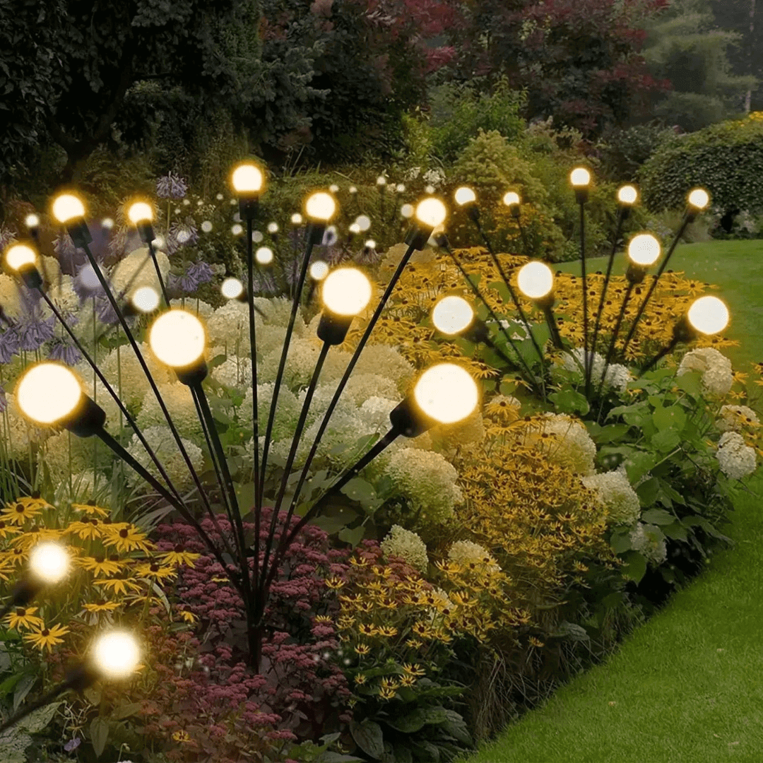 Zewnętrzna lampa solarna LED, efekt świetlików, magiczne oświetlenie ogrodu, odporność na warunki atmosferyczne, nowoczesny elegancki design.