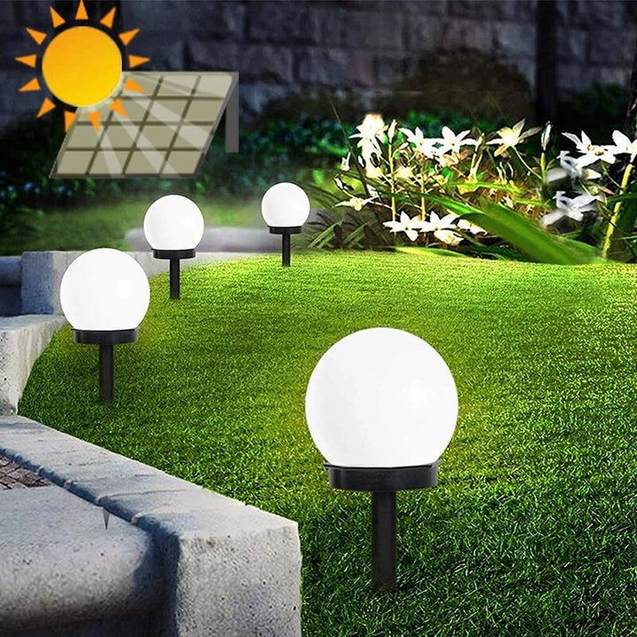 Solarne lampy ogrodowe LED, wodoodporne i ekologiczne, o nowoczesnym dyskowym designie do trwałego oświetlenia zewnętrznego.