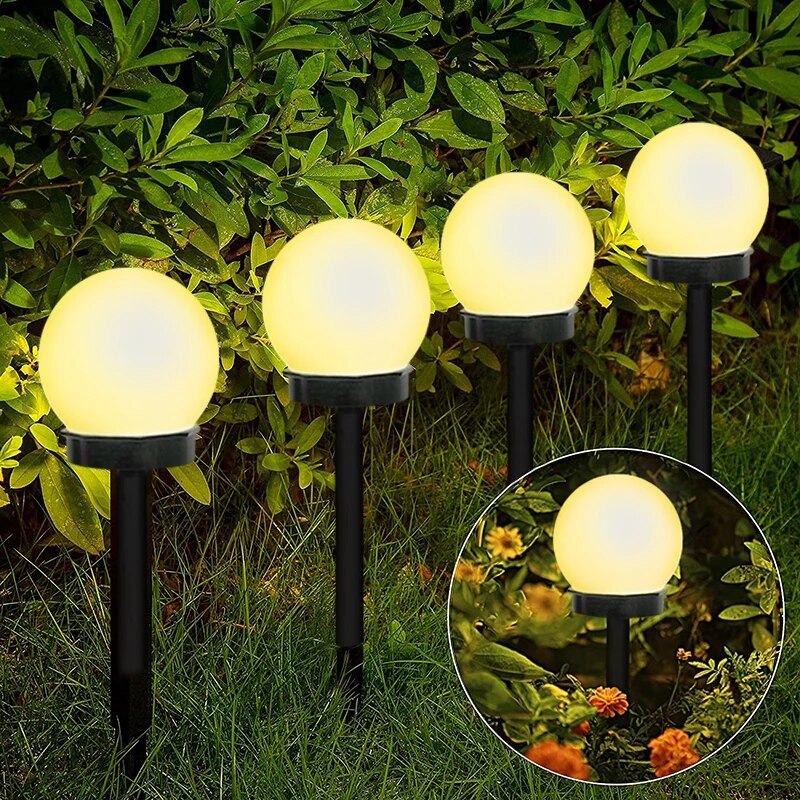 Solarne lampy ogrodowe LED, wodoodporne i ekologiczne, o nowoczesnym dyskowym designie do trwałego oświetlenia zewnętrznego.