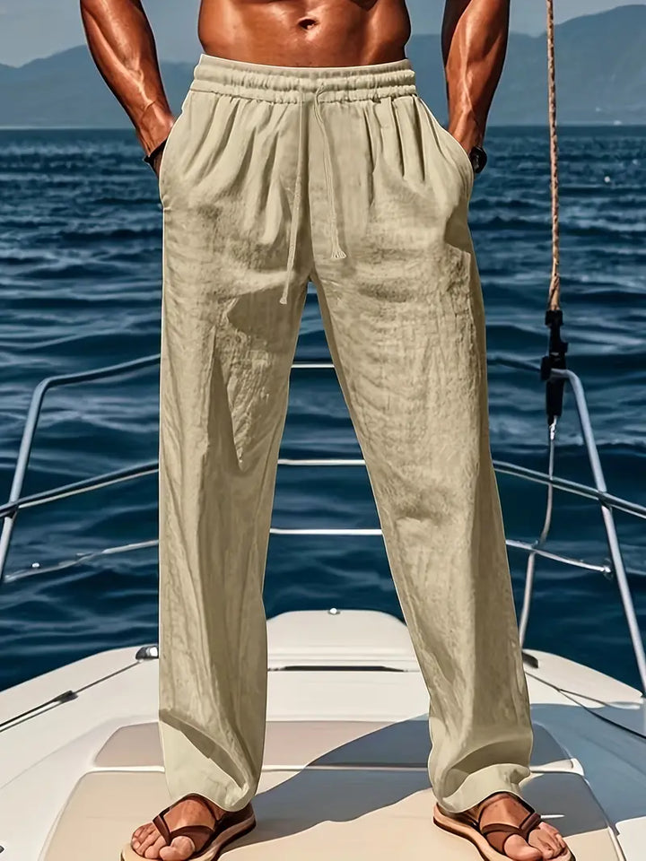 "Pantalon ample homme en lin respirant, coupe moderne et élégance estivale pour confort et fraîcheur optimale."