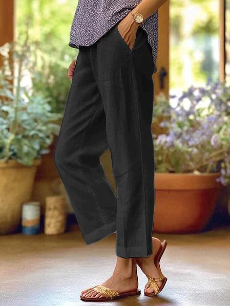 Lniane spodnie letnie dla kobiet, lekkie, eleganckie, z elastycznym pasem, idealne na słoneczne dni i różnorodne okazje.