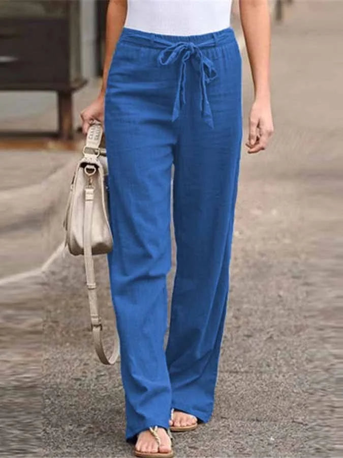 Damskie letnie spodnie lniane, wysoki stan, luźny krój, lekkie i przewiewne dla letniej elegancji.