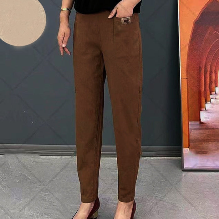 Nowoczesne bawełniane spodnie damskie, z elastycznym dopasowaniem, dostępne w kolorach beżowym, czarnym i khaki, eleganckie i wszechstronne.
